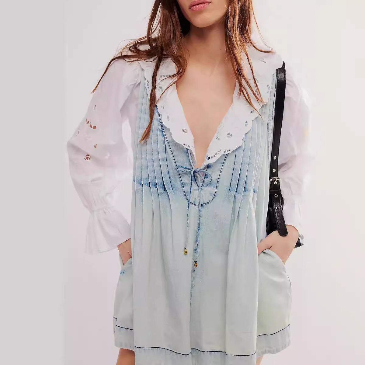V-hals mouwloze denim romper